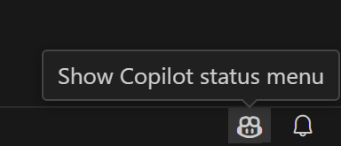 Hover over the Copilot status bar item displays "Show Copilot status menu"