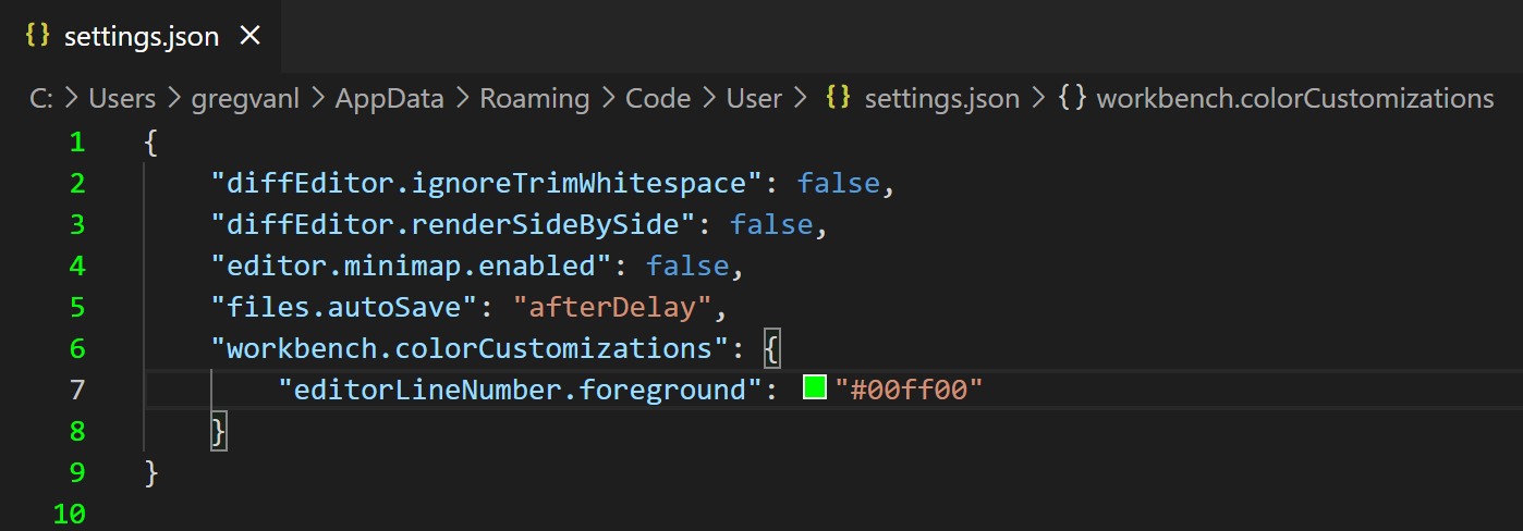 settings.json editor with green line numbers